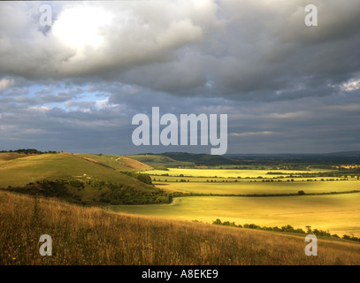 View of the Vale of Pewsey from Knap Hill on the Marlborough Downs in evening light Wiltshire UK Stock Photo
