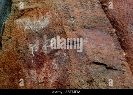 Vandalism in Cueva de las Manos del Rio Pinturas, Cave of the Hands, Patagonia, Province of Santa Cruz, Argentina Stock Photo