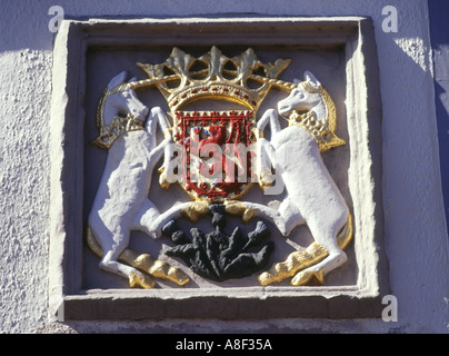 dh  WHITHORN DUMFRIES Town coat of arms on white wash house building heraldry galloway Stock Photo