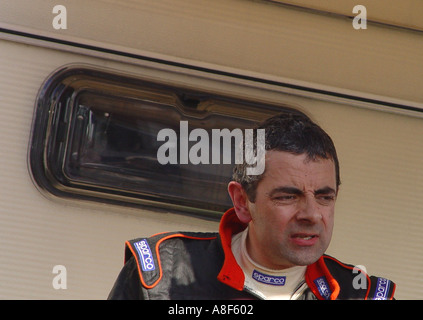 Rowan Atkinson at a motor racing circuit England GB UK 2003 Stock Photo