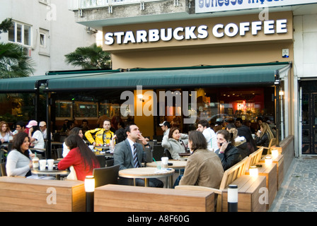 people have starbucks coffee in the trendy xintiandi area in shanghai china june 19 2006 stock photo alamy