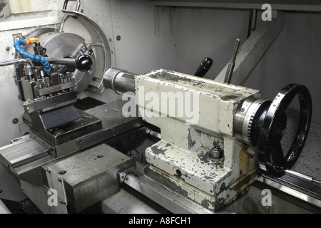 chuck, tailstock and control panel of CNC lathe Stock Photo