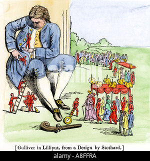 Gulliver in Lilliput as described by Jonathan Swift in Gullivers Travels. Hand-colored woodcut Stock Photo