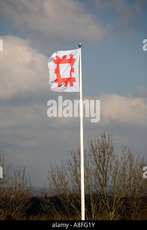 The flag of English Heritage flying in the breeze at Goodrich Castle near Ross on Wye Herefordshire England UK Stock Photo
