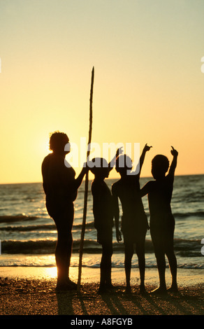 aboriginals gazing at the sea, Darwin, Australia Stock Photo