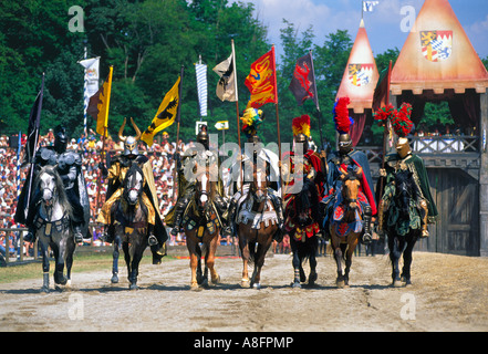 Knights on horse holding lance flag in tournament Medieval festival in Kaltenberg Bavaria Germany Stock Photo