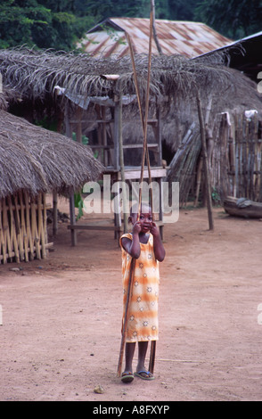 Young African girl in rural village. Volta Region, Ghana, West Africa. Stock Photo