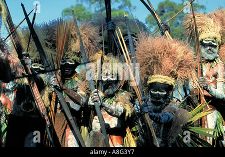 decorated aboriginals with bows and arrows, Mt. Hagen, Papua New Guinea Stock Photo