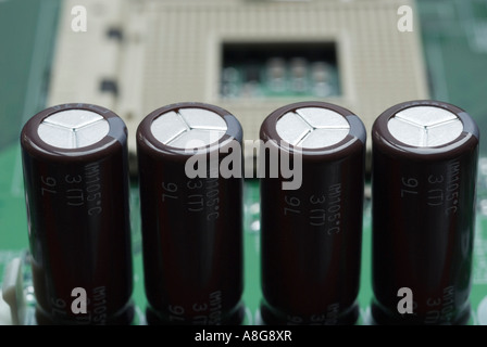 Capacitors on a computer motherboard Stock Photo