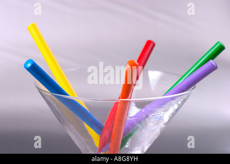 Crayons of different colors in a martini glass Stock Photo