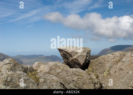 Stone balanced on wall in the Lake District Stock Photo
