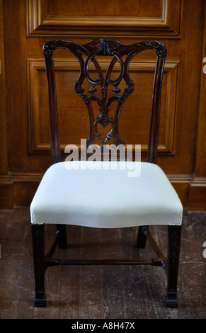 A CHIPPENDALE CHAIR IN THE DINING ROOM AT HALSWELL HOUSE NEAR BRIDGWATER SOMERSET UK Stock Photo