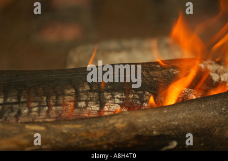 Masai camp fire in the Masai Mara, Kenya Stock Photo