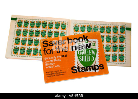 Green Shield stamps in book from 1970s used to collect points from purchases in petrol stations and shops UK Stock Photo