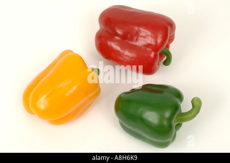 Vegetable produce typical supermarket bought sweet capsicum peppers red green yellow Stock Photo