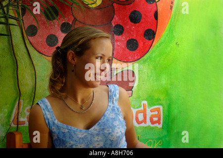 Mexico, Playa del Carmen, Woman in cafe Stock Photo