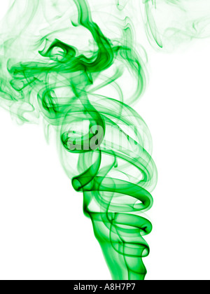 Colorized incense smoke trails on a white background Stock Photo