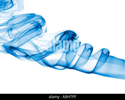 Colorized incense smoke trails on a white background Stock Photo