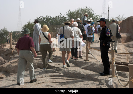 Tourists looking at the unfinished Obelisk Aswan Upper Egypt North Africa Middle East Stock Photo