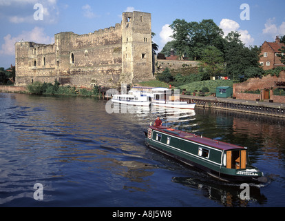 Narrowboat & historical stone ruins of Newark Castle Scheduled Ancient Monument & Grade I listed building on River Trent Nottinghamshire England UK Stock Photo
