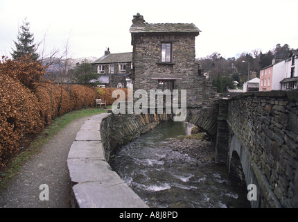 Bridge House tiny stone house on top of a bridge over a stream in