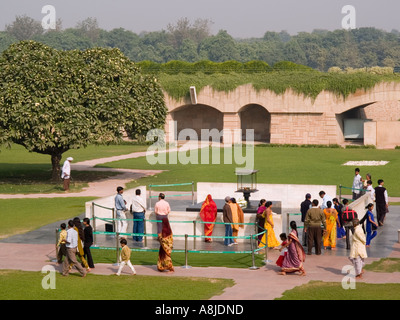 Raj Ghat Memorial to Mahatma Gandhi with Asian families paying their respects . Old Delhi India Asia Stock Photo