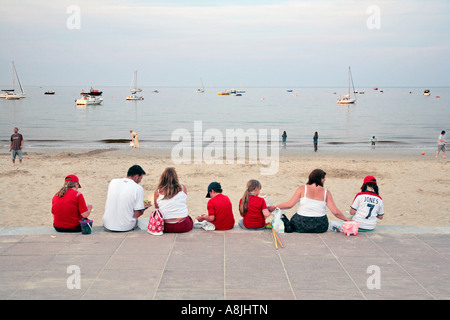 a family eating fish and chips in swanage dorset Stock Photo