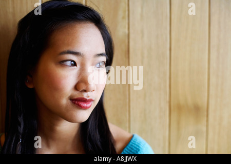 Close-up of a young woman grinning Stock Photo