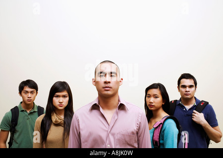 Portrait of three young men and two young women Stock Photo