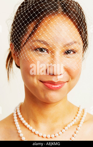 Portrait of a bride grinning Stock Photo