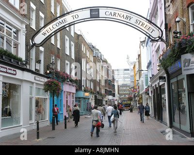 welcome to carnaby street swinging 60's london sign over street england uk gb Stock Photo