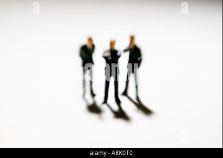 models of businessmen in group viewed from above Stock Photo