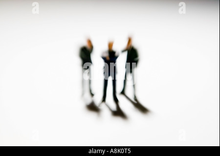 models of businessmen in group viewed from above Stock Photo