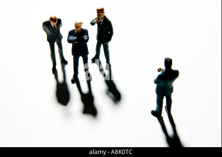 models of businessmen in group viewed from above Stock Photo