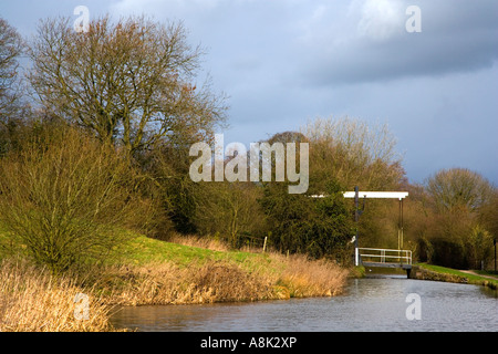 View of Turf Lea Lift Bridge crossing the Peak Forest Canal  at Marple near Stockport in Cheshire Stock Photo