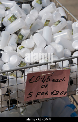 Bottles for Holy Water, Knock, County Mayo, Ireland, on sale in local shop Stock Photo