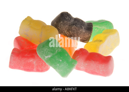 Horizontal close up of a pile of multi coloured jelly babies on a white background. Stock Photo