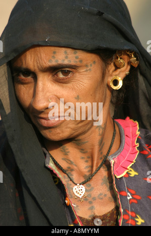 Banjana tribal woman  wearing traditional earring and tattoos.Gujarat  India