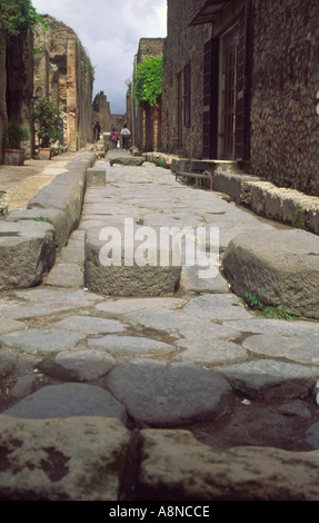 Excavated Paved Street in the Ancient Roman Town Pompeii Italy Stock Photo