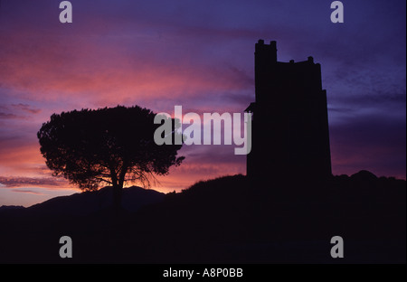 Sunset with tree and water tower, Andalucia, Spain Stock Photo