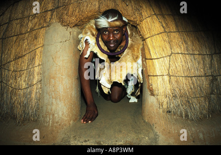 guide in early style ndebele house, kgodwana village, kwa-ndebele, south africa Stock Photo