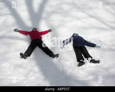 Child Laying In Snow Enjoying Winter Play Outdoors Stock Photo Alamy child-laying-in-snow-enjoying-winter-play-outdoors-stock-photo-alamy