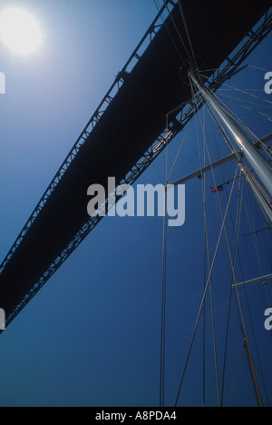 Three masted staysail Schooner Aquarius W passes under Newport bridge Newport Rhode Island USA Stock Photo