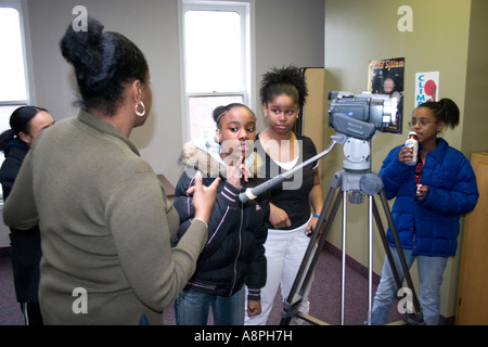 Girls recording videos of their stories. Girls self-esteem Program St Paul Minnesota USA Stock Photo