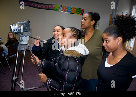 Teens video recording their images. Girls self-esteem Program St Paul Minnesota USA Stock Photo