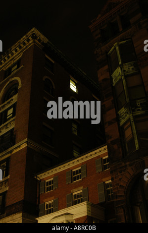 Single lit office in office building at night Stock Photo