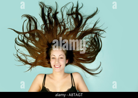 long-haired brunette young woman Stock Photo