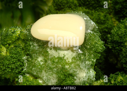 Butter Melting Over Steamed Broccoli Stock Photo