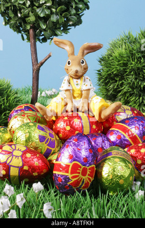 Easter bunny sitting Easter eggs Stock Photo