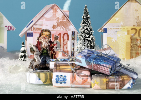 Santa Claus with money gifts Stock Photo